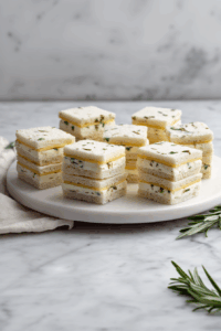 Arrange the Gouda cheese tea sandwiches on a serving platter or plate and serve immediately, or cover and refrigerate until ready to serve. Enjoy!