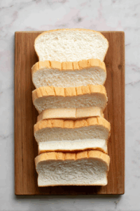 Lay out the slices of sandwich bread on a clean work surface.