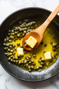 Remove from heat and whisk in butter until melted