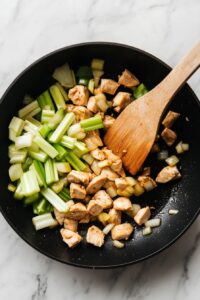 Stir in celery, bamboo shoots, and water chestnuts; sauté for 3-4 minutes.