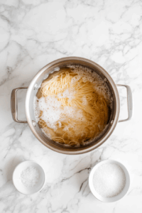 Cook spaghetti in salted boiling water until al dente; drain and set aside.