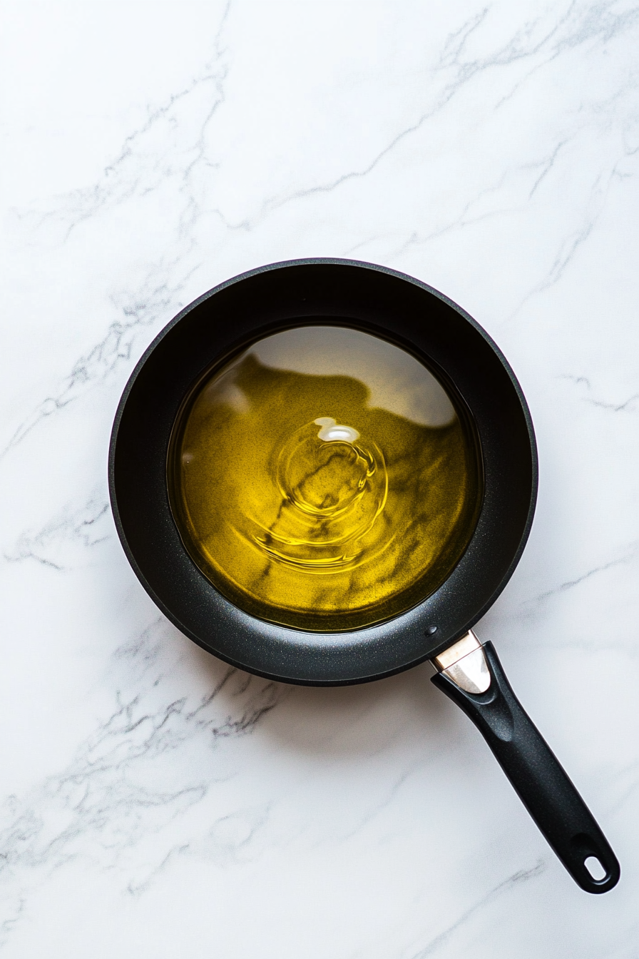 Heat oil in a deep pan over medium-high heat until hot (350°F/175°C).