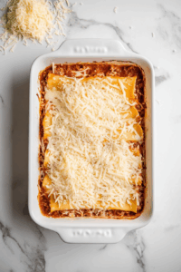 Top with reserved mozzarella cheese.