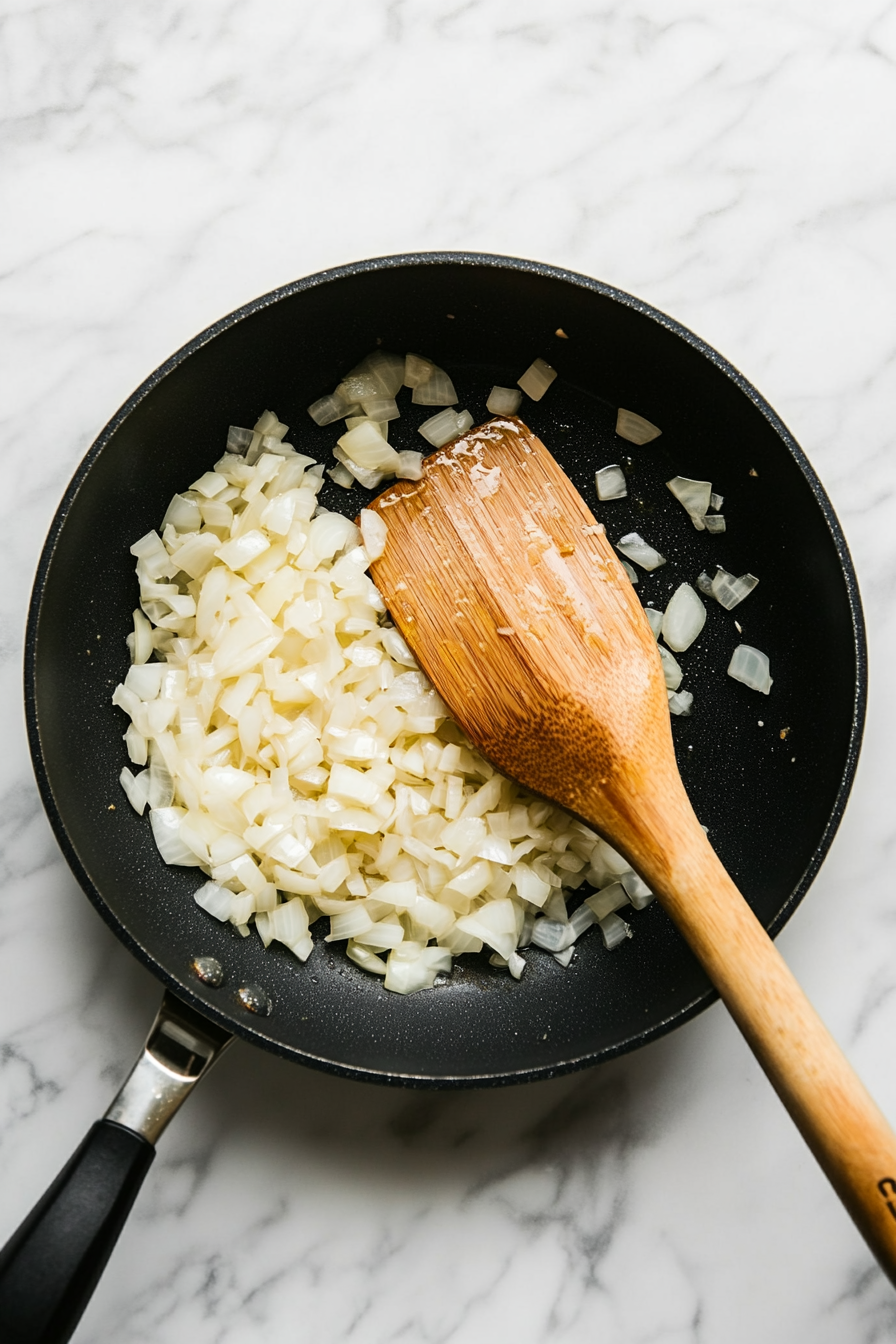 Add chopped onions and sauté until golden brown.