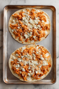 Top with buffalo chicken mixture.