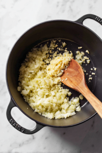Stir in garlic and ginger; cook until fragrant.