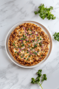 Slice and serve hot: Delicious BBQ Chicken Pizza Recipe in 25 Mins!