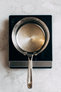 Turn on medium heat and bring to a gentle simmer.