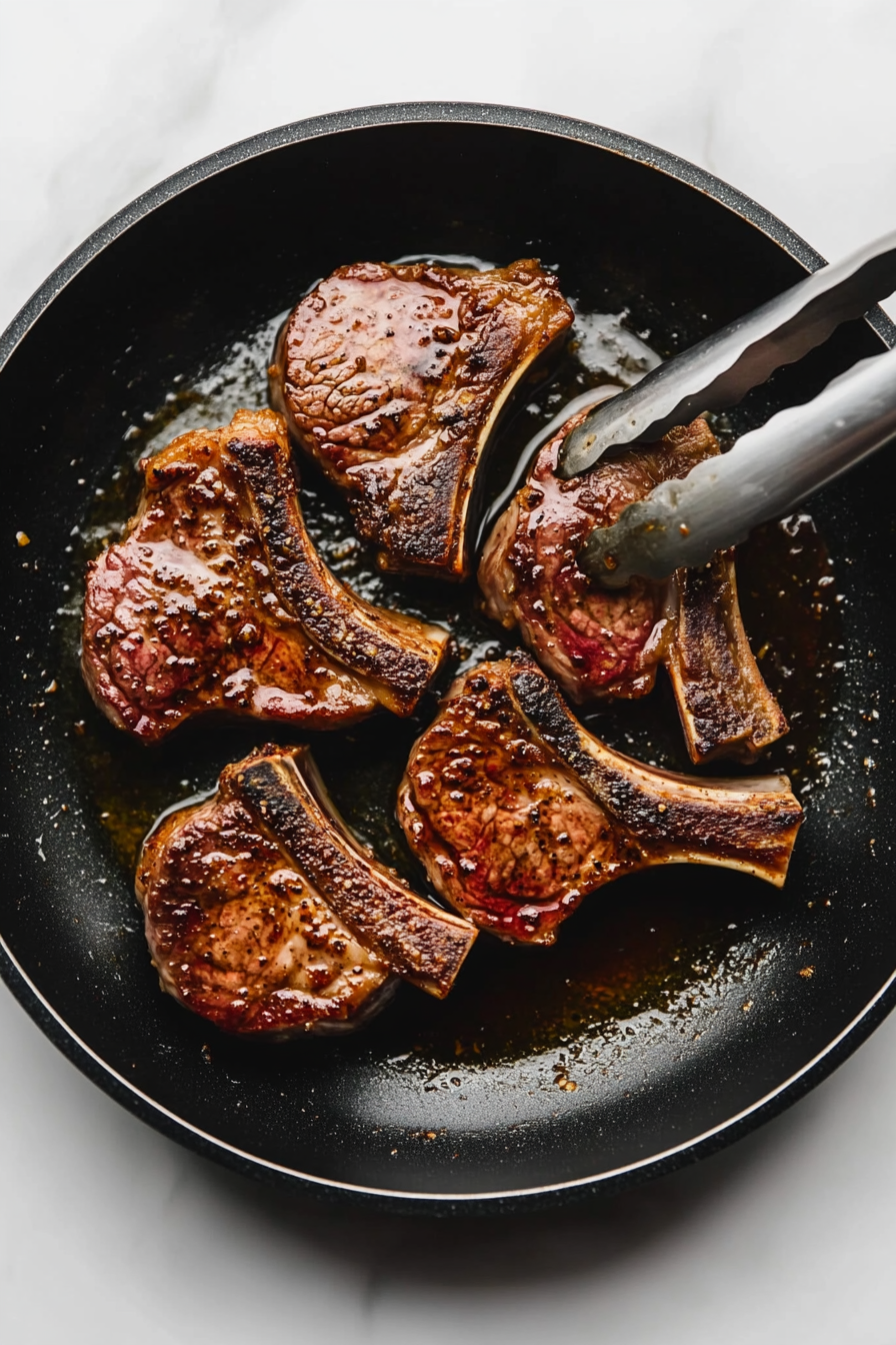 Cook the lamb chops for about 4-6 minutes per side, depending on thickness and desired doneness.