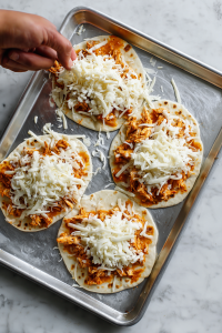 Sprinkle shredded mozzarella over the top.