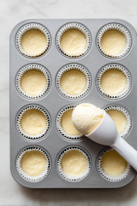 Spoon batter into liners, filling ¾ full. Bake for 18–20 minutes.