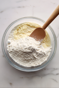 Add flour, baking powder, and salt. Mix until smooth.