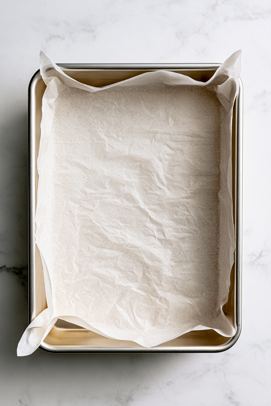 Line a 9×13-inch baking pan with parchment paper or foil, leaving an overhang for easy removal