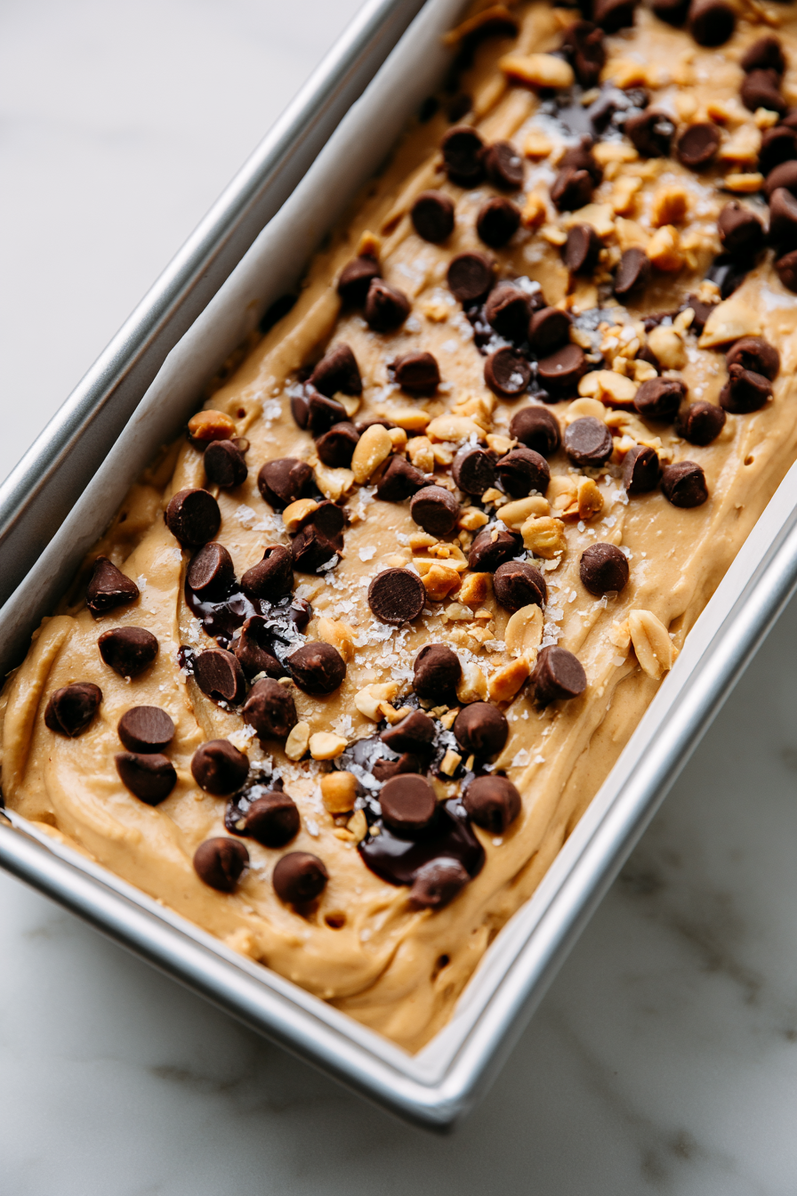 Sprinkle mini chocolate chips and a pinch of flaky sea salt on top